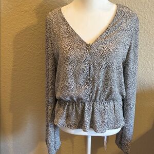 Sienna Sky women’s black and white blouse.